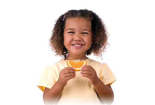 Girl eating an orange